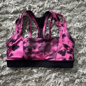 black and pink lulu lemon sports bra